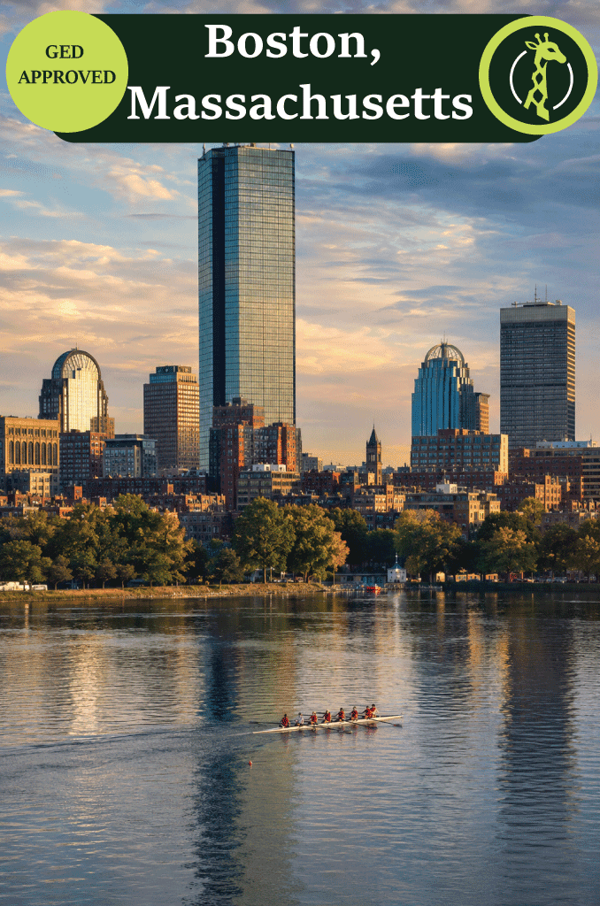 The Boston skyline at dusk over the Charles River.