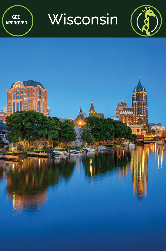 The Milwaukee skyline at dusk over Lake Michigan.